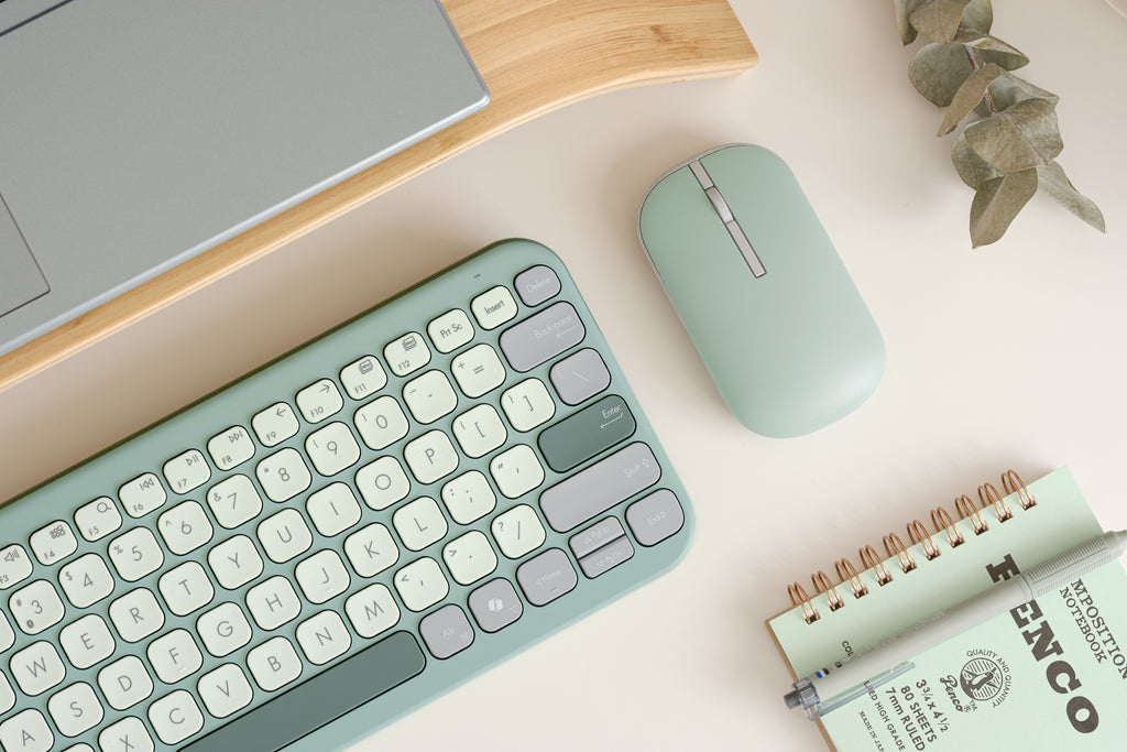 ASUS Marshmallow Keyboard KW100 Green Tea Latte on a desk