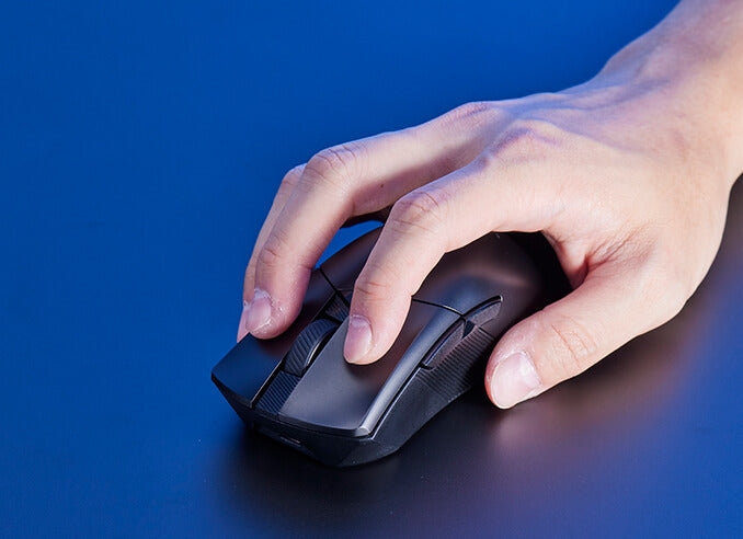 A hand clicking on the ROG Gladius III Wireless AimPoint