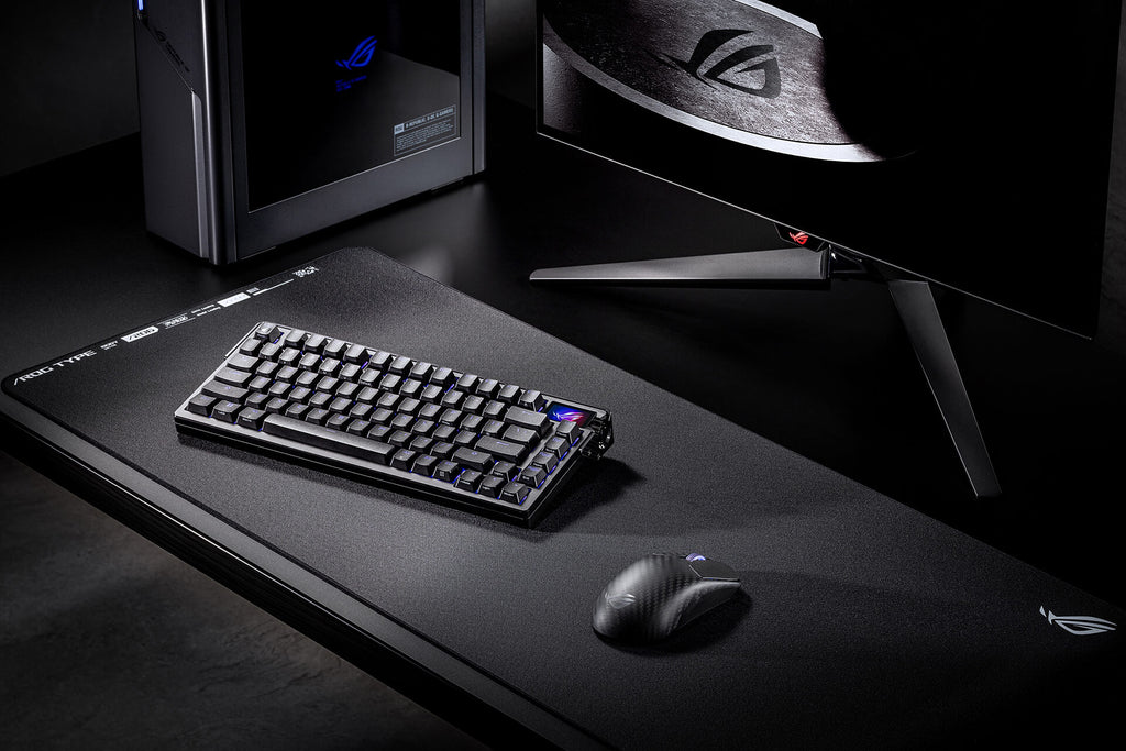 The ROG Harpe Ace Extreme in a full setup scenario, set alongside the Azoth Extreme
