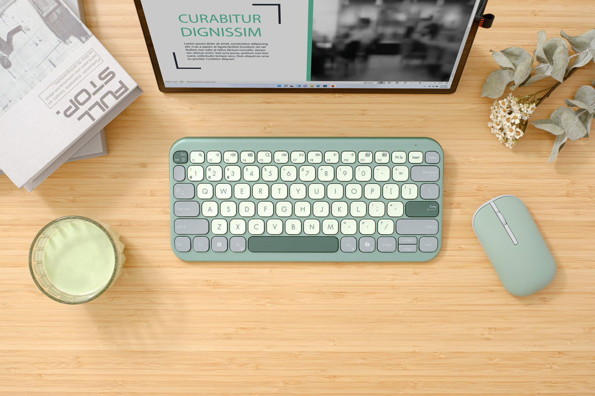 ASUS Marshmallow Keyboard KW100 Green Tea Latte on a desk