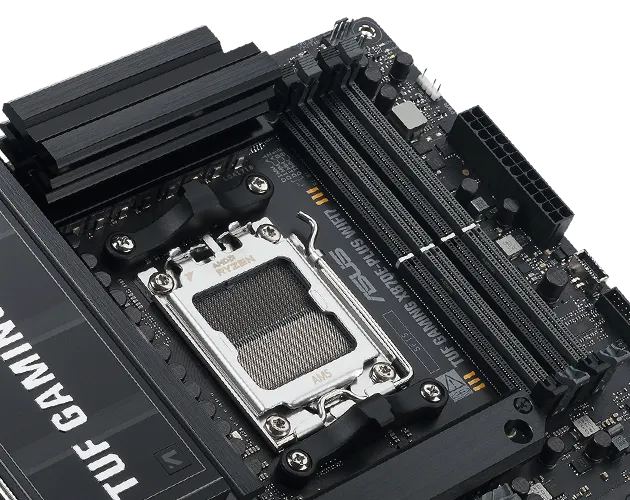 Close-up of X870E-PLUS WIFI7 showing DDR5 memory slots with a label indicating support for DDR5 modules up to 8000+ MHz.