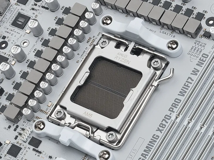 Close-up of an AM5 CPU socket on TUF GAMING X870-PRO WIFI7 W NEO.