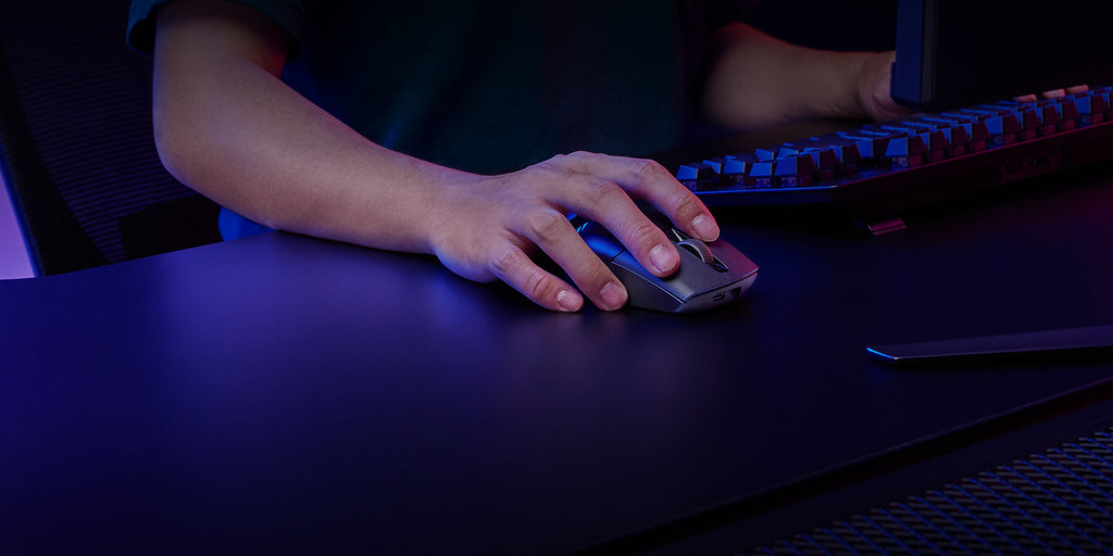 The ROG Keris Wireless AimPoint mouse being used in a full setup