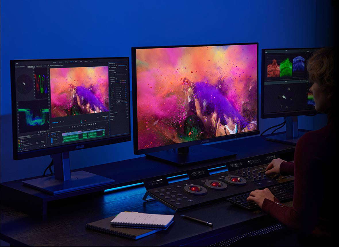 A creator grading colors on ProArt Display PA27DCE-K.