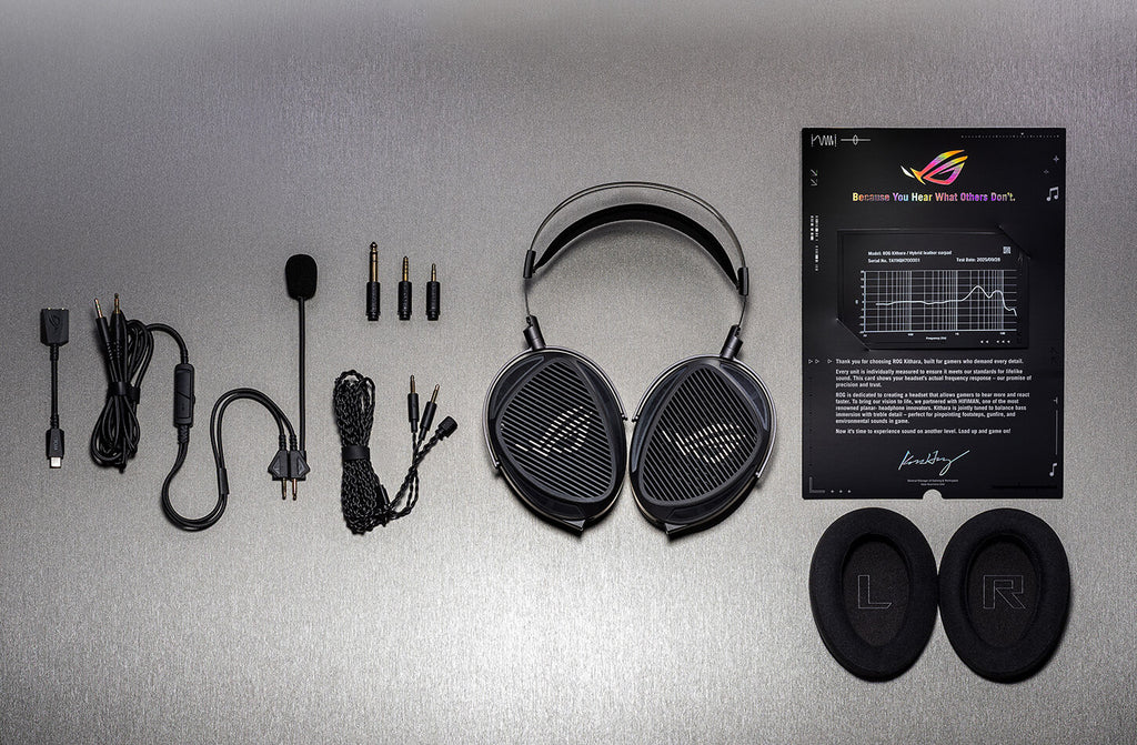 ROG Kithara gaming headset and included accessories laid out, including cables, swappable plugs, boom microphone, ear pads, and sound signature certificate