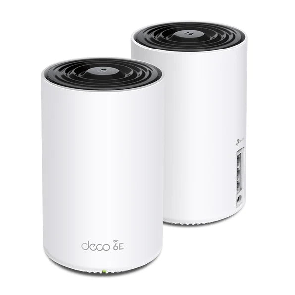 Two white Deco mesh Wi-Fi 6 routers on a white background.