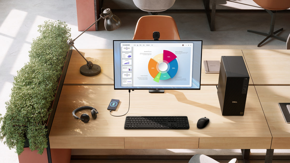 The Dell Pro P 27 Monitor - P2726H without stand on a desk with a desktop, keyboard, mouse, headphones, and phone.