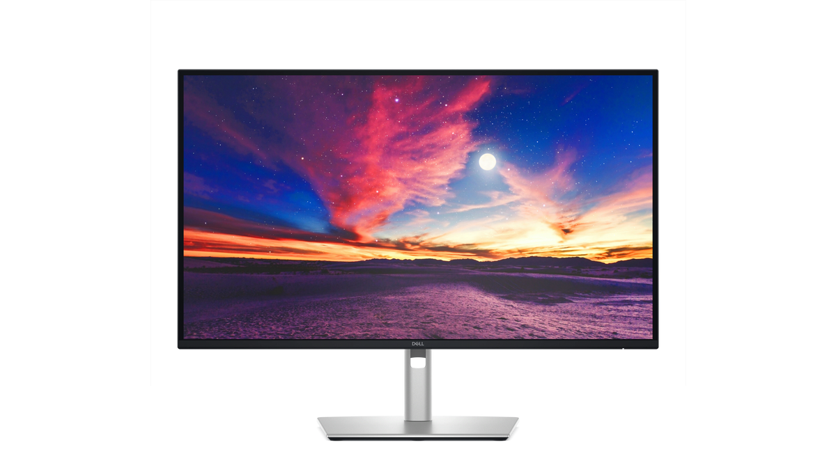 The Dell Pro 27 Plus 4K USB-C Hub Monitor with a screenfill showing a desert and a colorful sky.