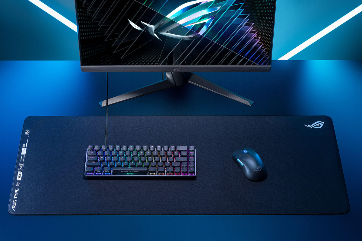 An ROG gaming gear set up containing the ROG Hone Ace XXL mousepad