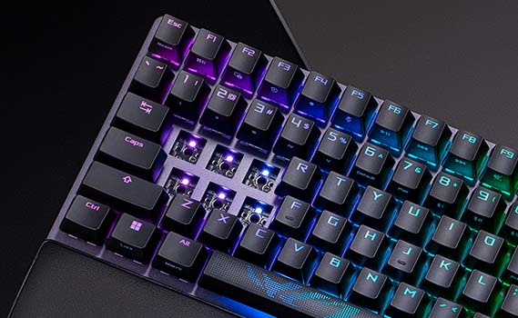Close-up of ROG Strix Scope II 96 Wireless with six keys removed to show the hot-swappable sockets