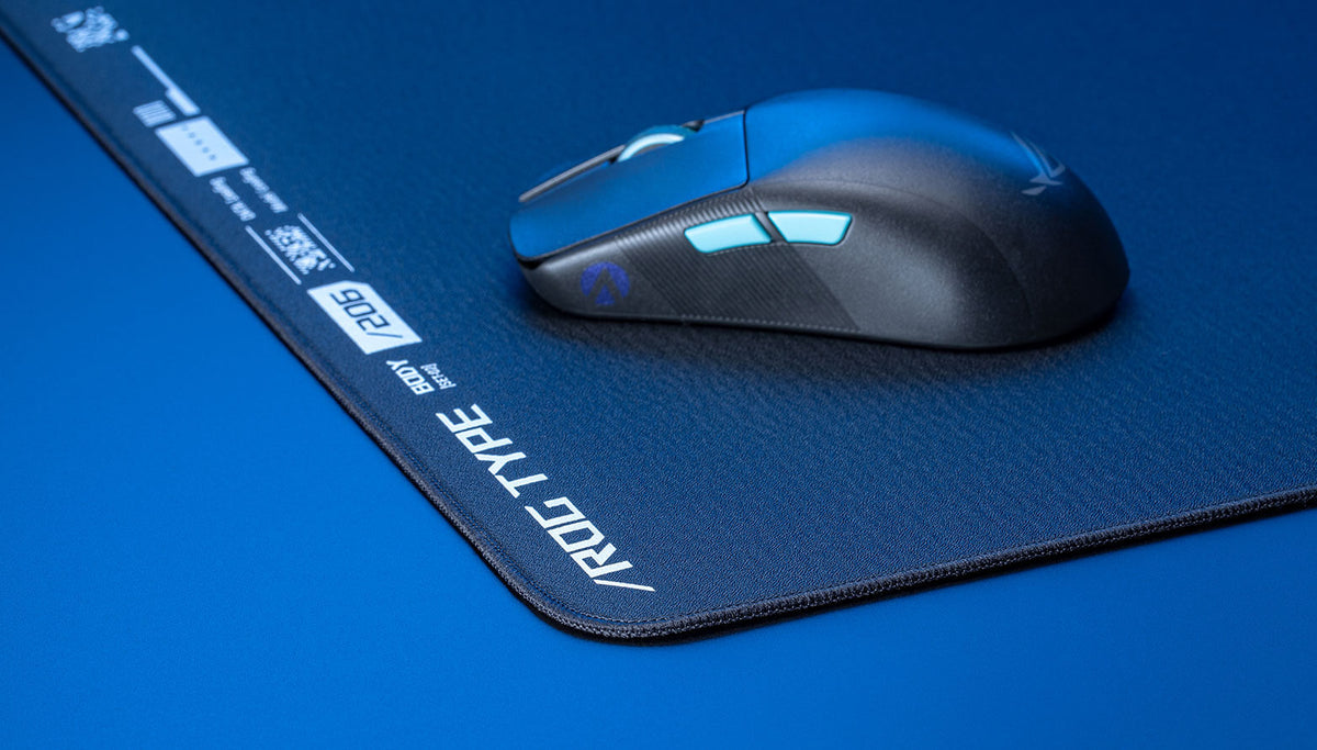 An image of the ROG Hone Ace XXL, with a mouse on top of it