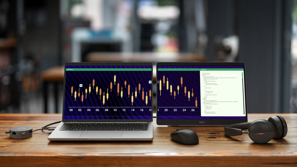 A Dell Pro 14 Plus laptop displays a chart that extends onto the screen of an adjacent Dell Pro 14 Plus Portable Monitor.