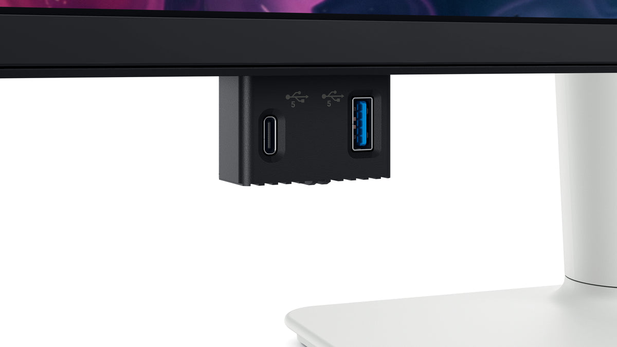 Close up of easy access pop-out ports on the bottom of the monitor.