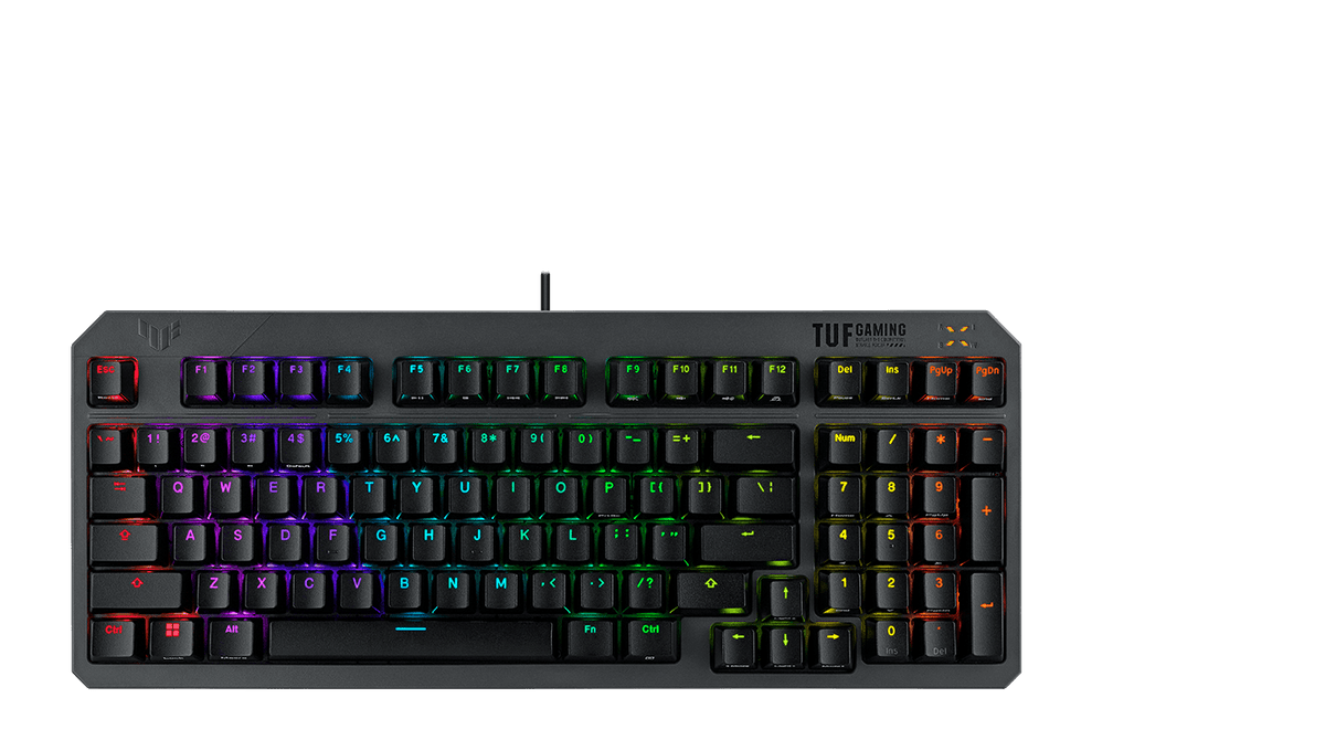 TUF Gaming K3 Gen II Keyboard laying on top of a 100% keyboard, showing its compact form factor.