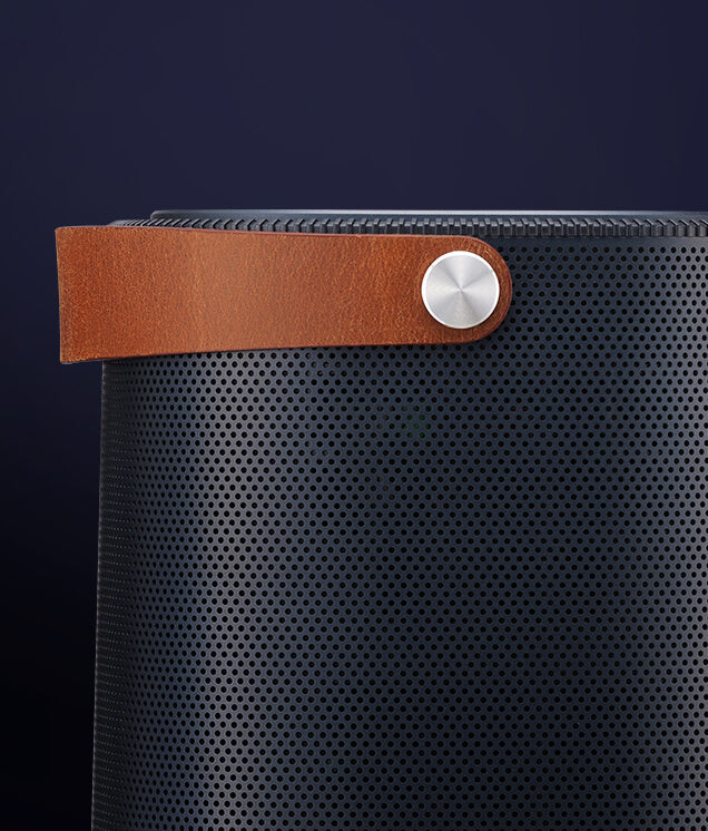 Zoom-in detail on sturdy leather carry handle of ASUS ZenBeam L2 smart portable LED projector